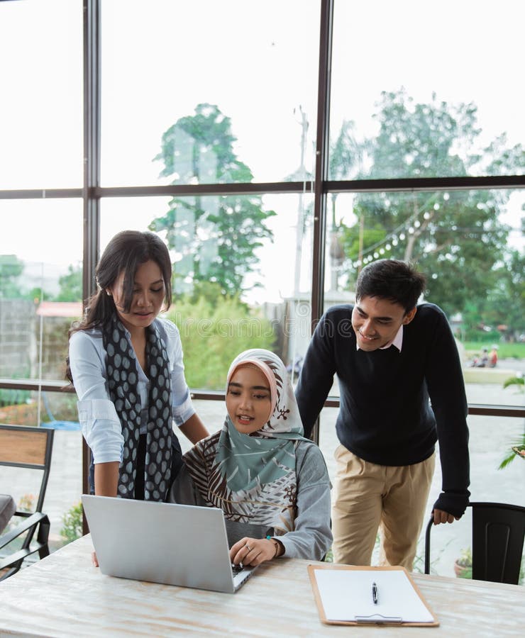 Mentoring female employees by more experienced department head witnessed by CEO of the company. Mentoring female employees by more experienced department head witnessed by CEO of the company